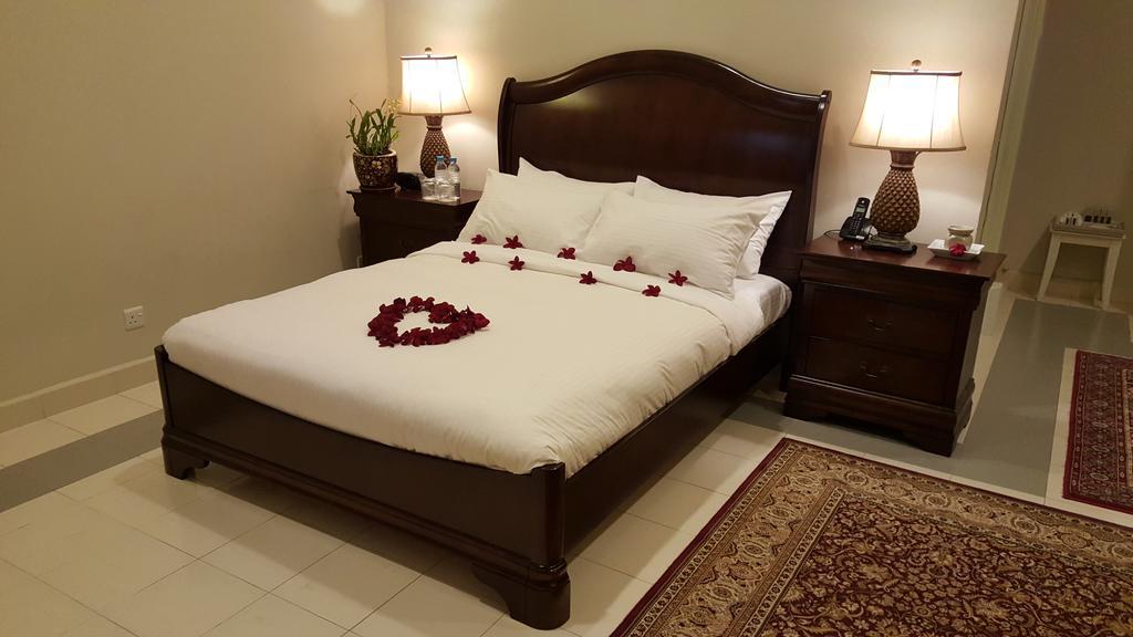 The Kahaani Hotel อาเยอร์ เกโระห์ ห้อง รูปภาพ